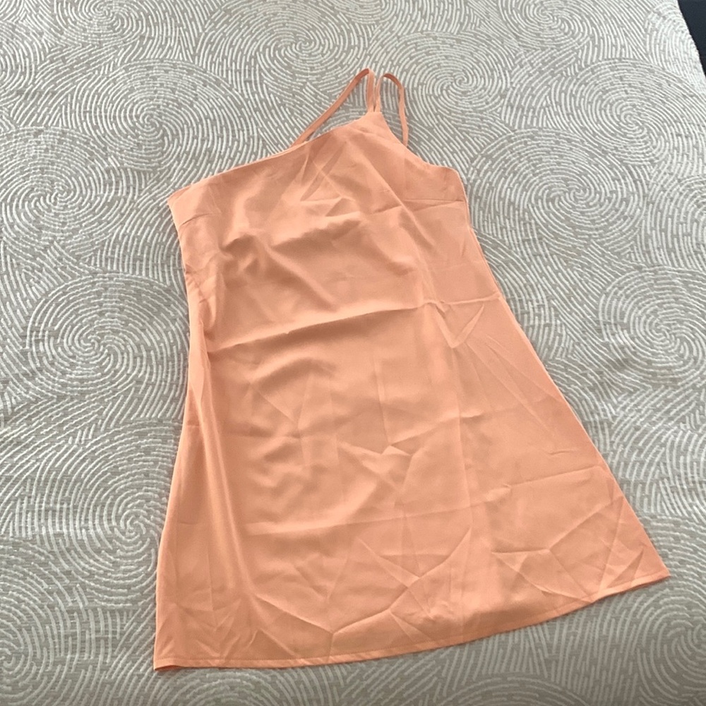 Peach heavier-weight satin dress. adjustable straps. Side zipper. Never worn